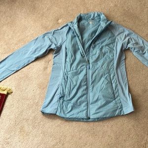 Light blue wind breaker/exercise jacket